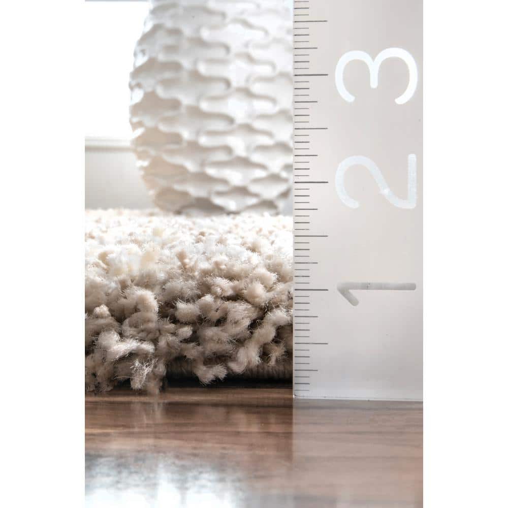 Dimora Cream Handmade Shaggy Chevron 7' x 9' Area Rug