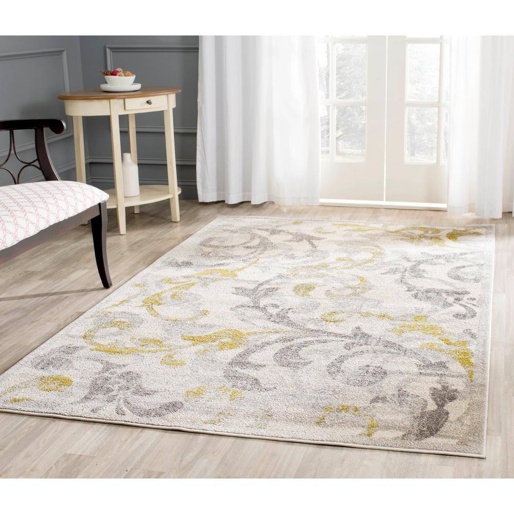 Ivory and Light Grey Floral Synthetic Area Rug