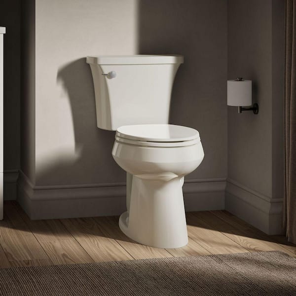 Highline Arc 12 in. Rough In 2-Piece 1.28 GFP Single Flush Elongated Chair Height Toilet in Biscuit with Soft Close Seat