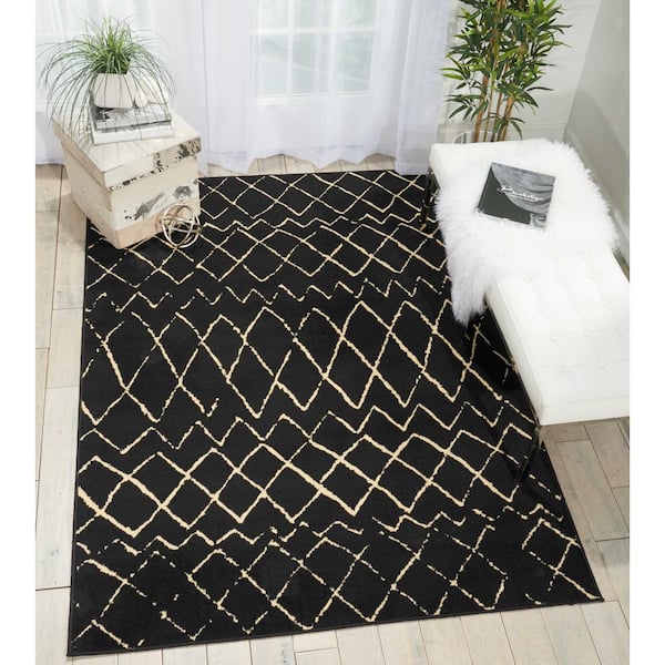https://images.thdstatic.com/productImages/aed670aa-f6ed-449a-ac39-83926b012cdc/svn/black-nourison-area-rugs-394767-e1_600.jpg