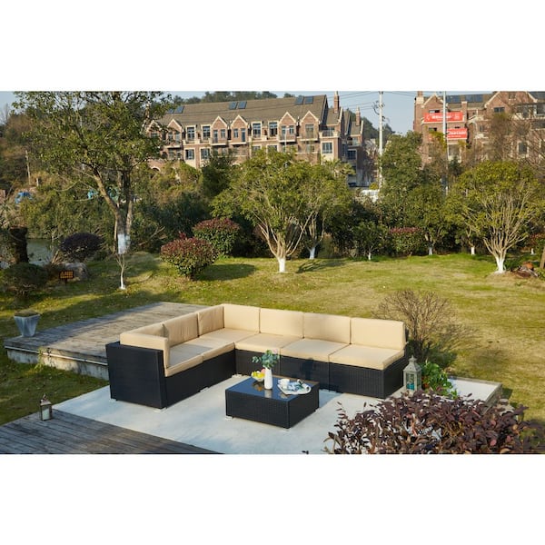 7-Piece Black Wicker Patio Conversation Set with Blue Cushions and Coffee Table