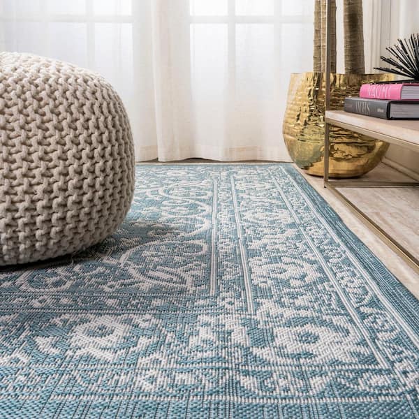 https://images.thdstatic.com/productImages/aef01fd7-75b8-4412-a3c4-faa328ef7d4f/svn/teal-ivory-jonathan-y-outdoor-rugs-smb120b-8-1f_600.jpg