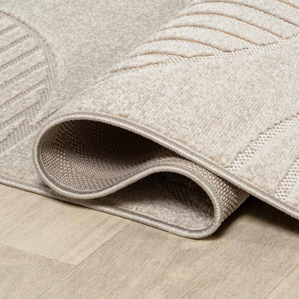 Ivory and Cream Geometric High-Low 8' x 10' Area Rug