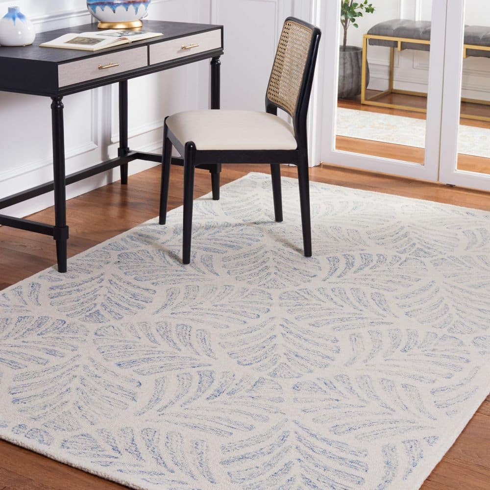 Ivory and Blue Handmade Wool Tufted 8' x 10' Area Rug