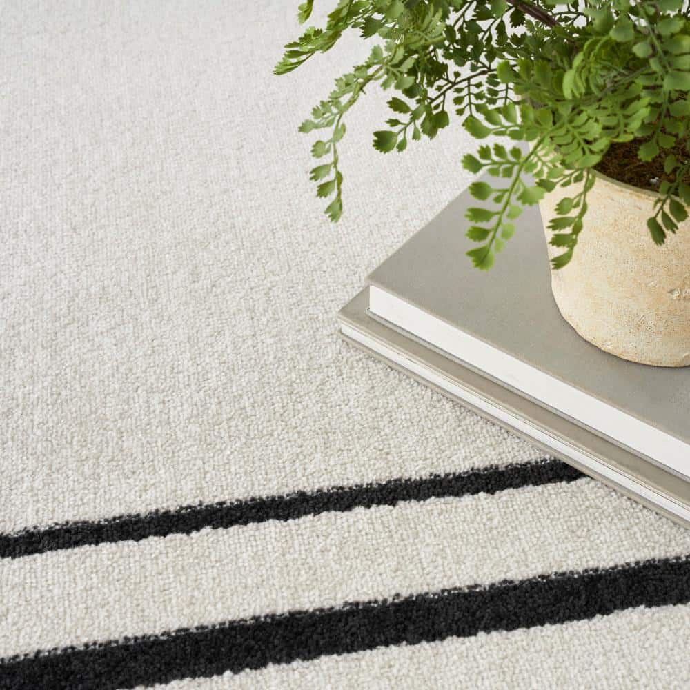 Rectangular Black and Ivory Synthetic 4' x 6' Washable Rug