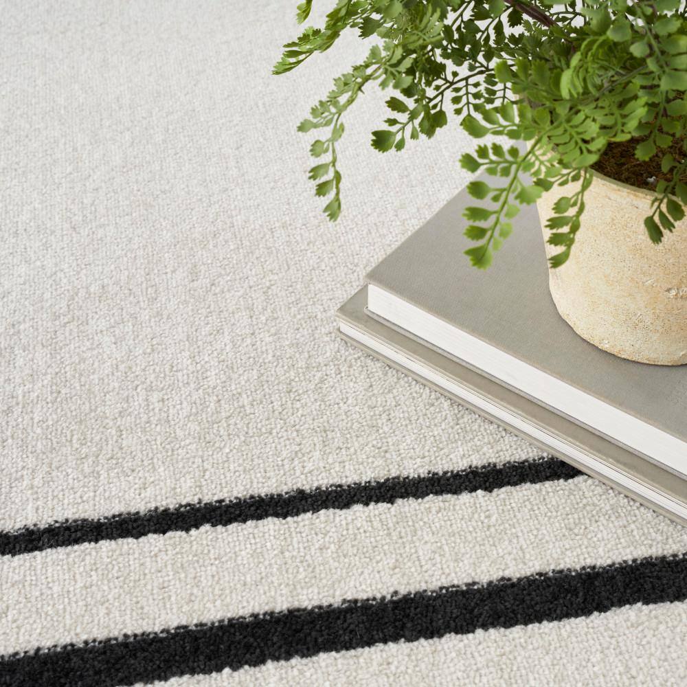 Rectangular Black and Ivory Synthetic 4' x 6' Washable Rug