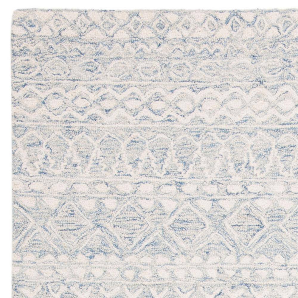 Handmade Tufted Wool Area Rug in Blue/Ivory, 4' x 6'