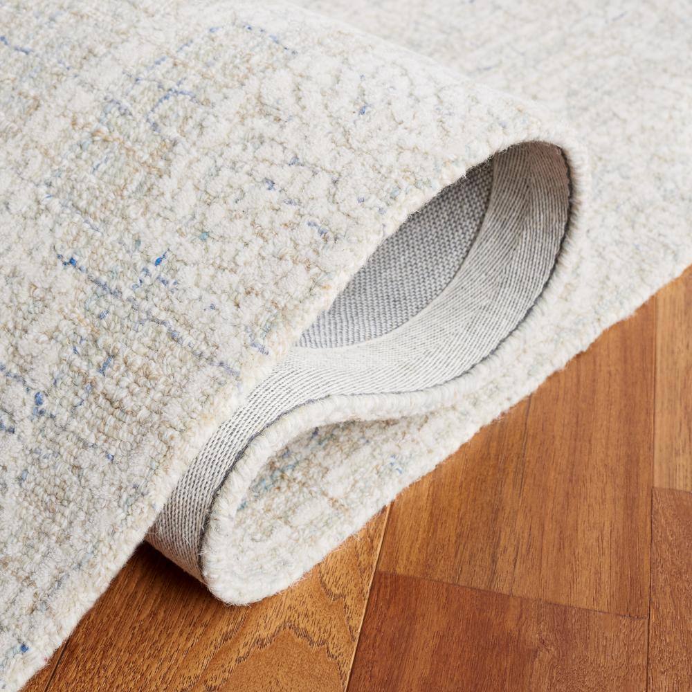 Handmade Blue and Ivory Wool Tufted 8' x 10' Rug
