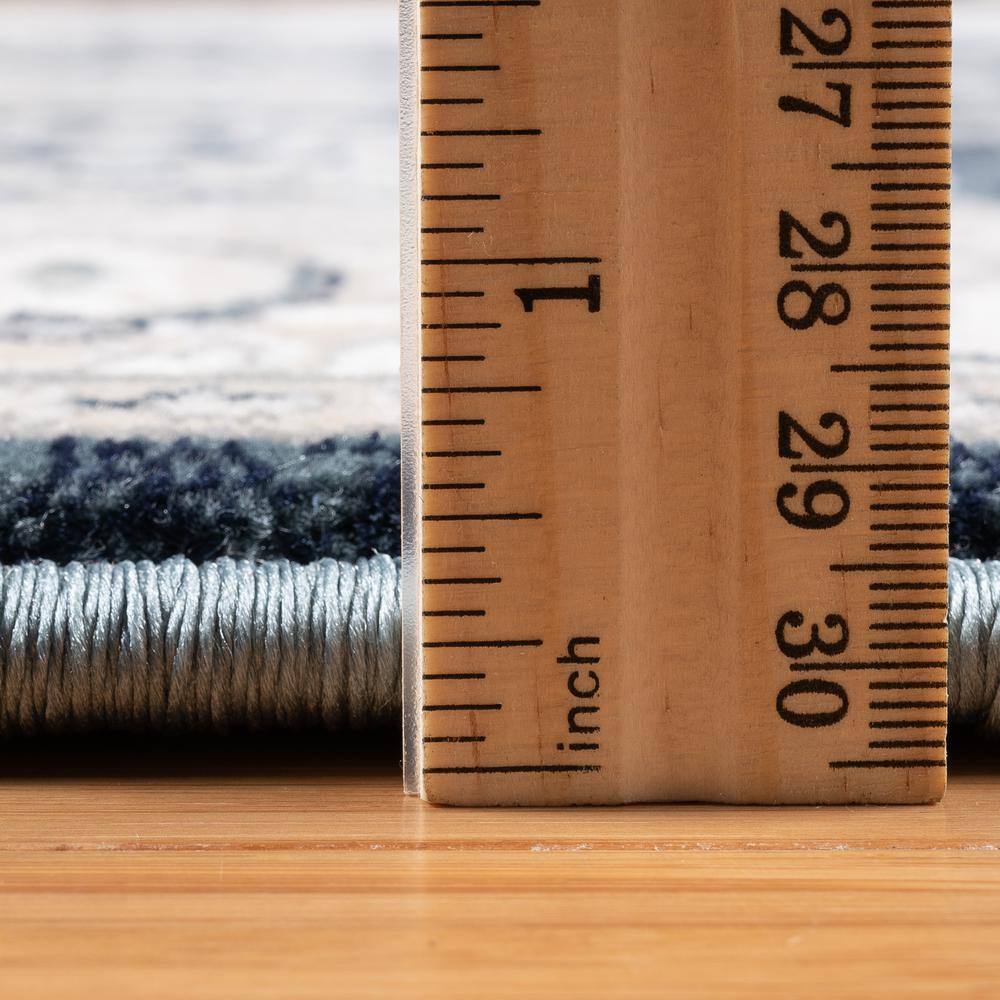 Moena Navy Blue and Ivory Synthetic Persian Area Rug