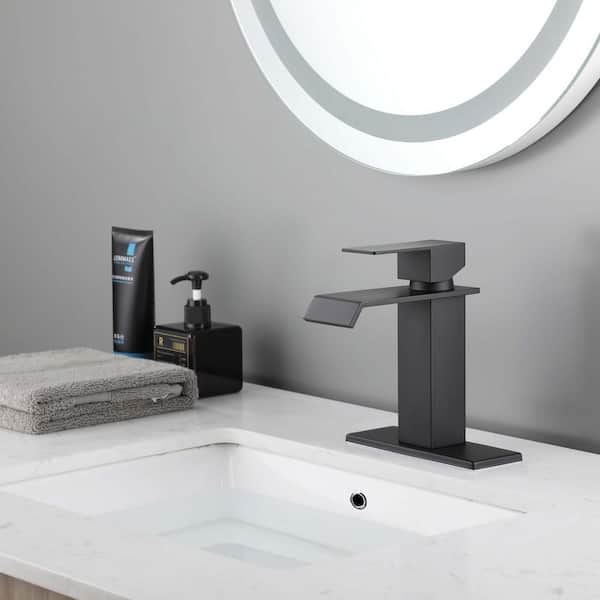 Waterfall Single Hole Single-Handle Low-Arc Bathroom Faucet with Pop-Up Drain Assembly in Matte Black