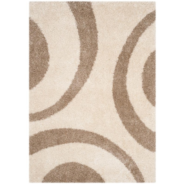 SAFAVIEH Portofino Shag Ivory/Beige 7 ft. x 9 ft. Geometric Area Rug
