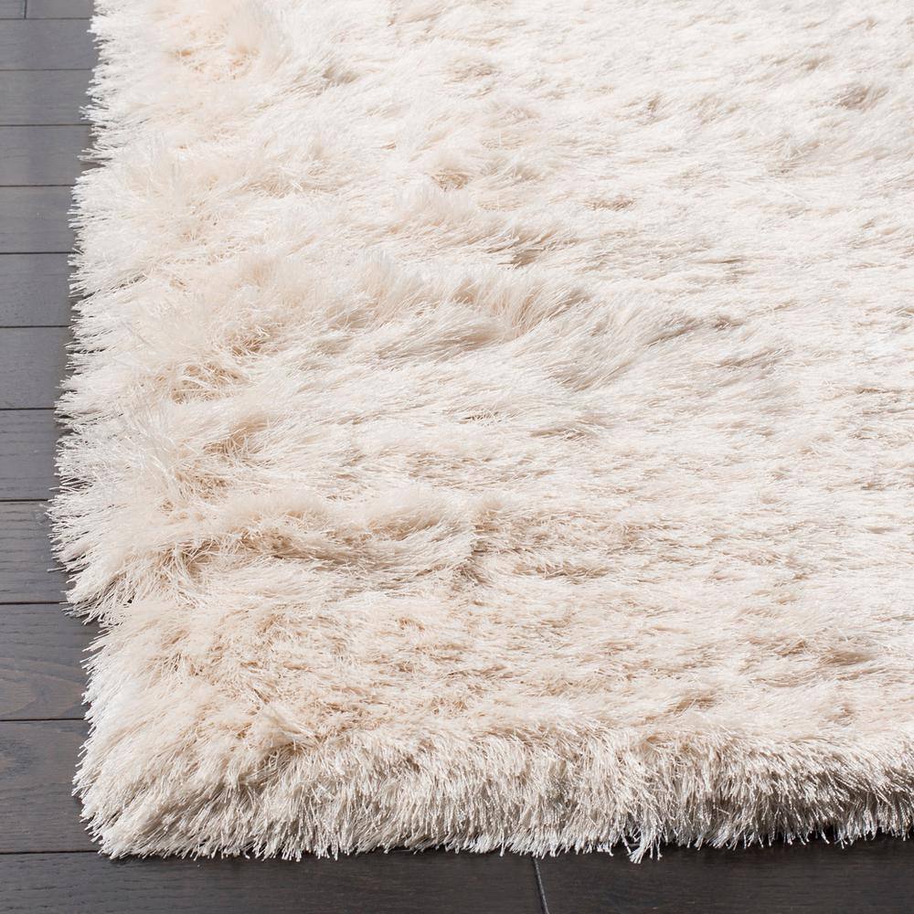 Ivory Tufted Shag 5' x 7' Wool and Synthetic Rug