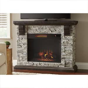 Highland 50 in. Freestanding Faux Stone Electric Fireplace TV Stand in Gray with Mantel