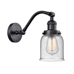 Bell 5 in. 1-Light Matte Black Wall Sconce with Seedy Glass Shade