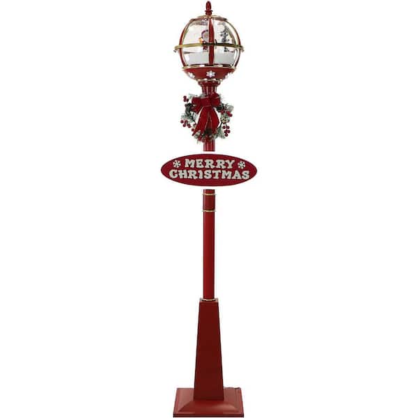 69 in. Christmas Snow Globe Lamp Post with Santa Scene, 2 Signs, Cascading Snow, and Christmas Carols