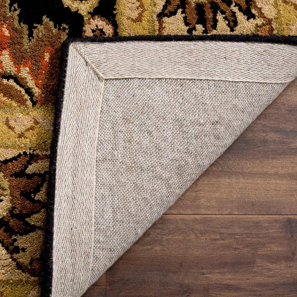 Handmade Black and Ivory Tufted Wool Area Rug