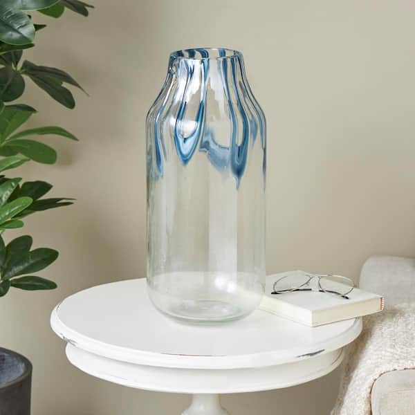 Litton Lane 17 in. Cream Glass Abstract Decorative Vase with Wavy Blue Design