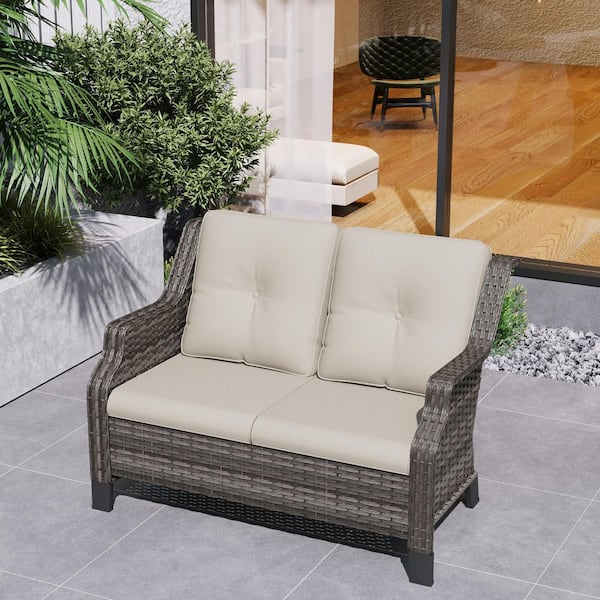 Brown Wicker Outdoor Patio Loveseat with Beige Cushions