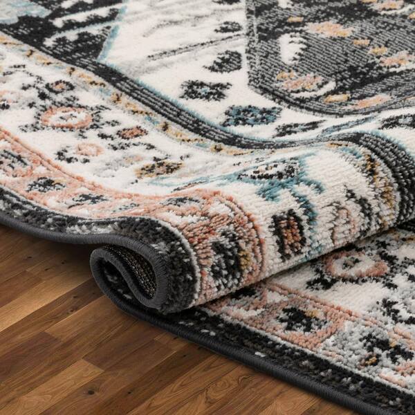 https://images.thdstatic.com/productImages/af905344-b01b-42ee-a4fe-39b9ff44cffb/svn/black-well-woven-area-rugs-ind-43-5-66_600.jpg