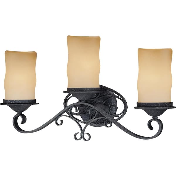 Volume Lighting Sevilla 3-Light Indoor Antique Wrought Iron Bath / Vanity Wall Mount w/ Candle-Shaped Sandstone Glass Shades