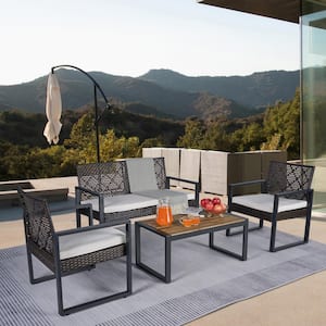 4-Piece Patio Brown Wicker Furniture Conversation Set with Beige Cushions And Acacia Wood Table Top