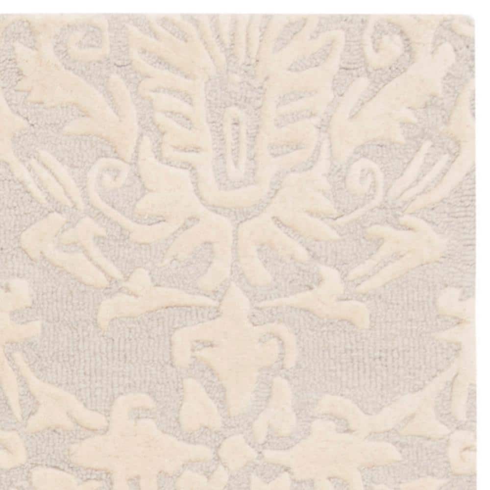 Light Grey and Ivory Floral Wool Tufted Area Rug 5' x 8'