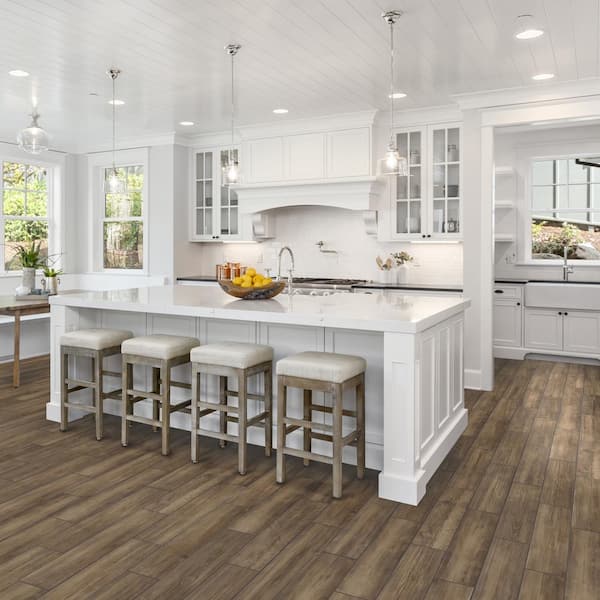 https://images.thdstatic.com/productImages/afc35c6e-0dc9-45b6-b245-58f89a7edf51/svn/brown-matte-florida-tile-home-collection-porcelain-tile-chdetac016x24p-40_600.jpg