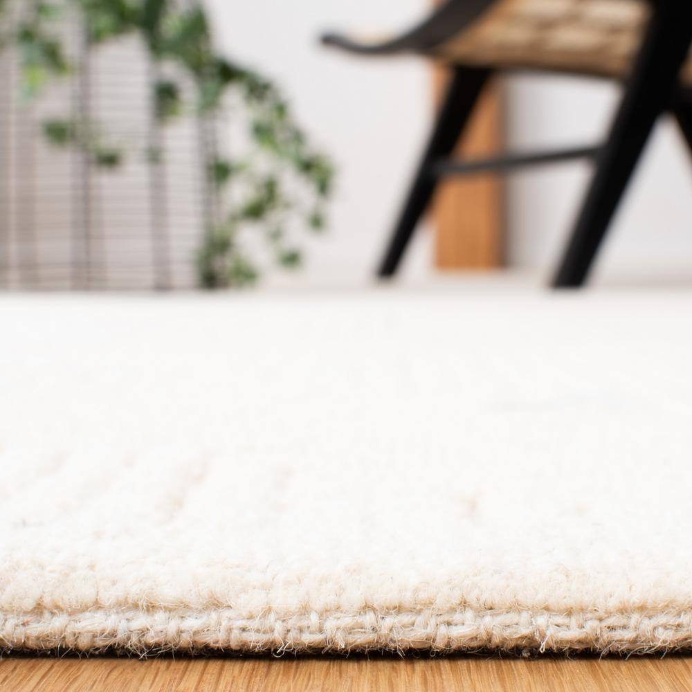 Ivory Handmade Tufted Wool 2' x 3' Area Rug