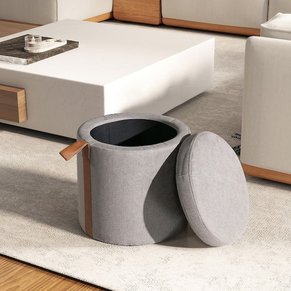 Corli Uptown Grey Modern Upholstered Linen Round Storage Ottoman with Leather Accent Strip