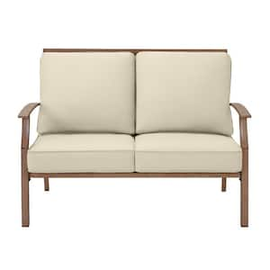 Geneva Brown Wicker Outdoor Patio Loveseat with CushionGuard Putty Tan Cushions