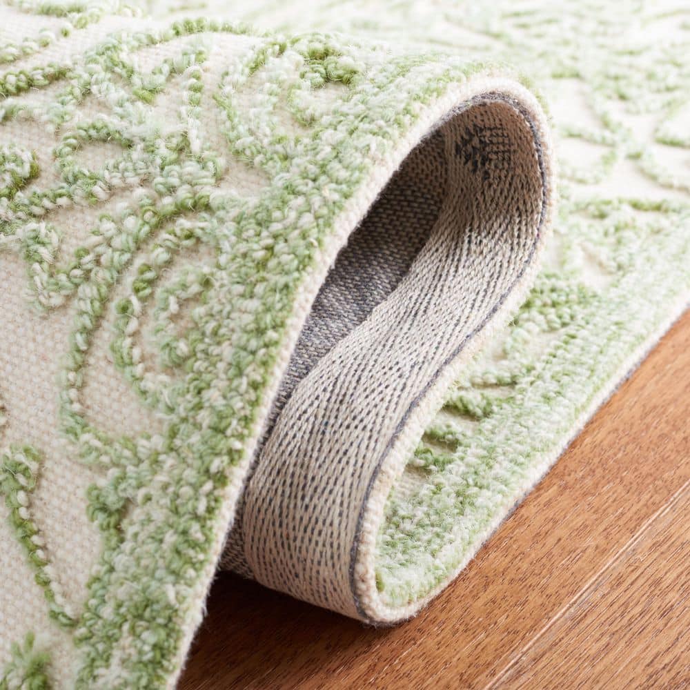 Ivory and Green 9' x 12' Handmade Tufted Wool Area Rug