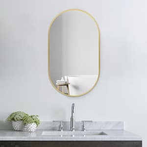 Athena 20 in. W x 33 in. H Small Oval Aluminum Framed Wall Bathroom Vanity Mirror in Brushed Gold