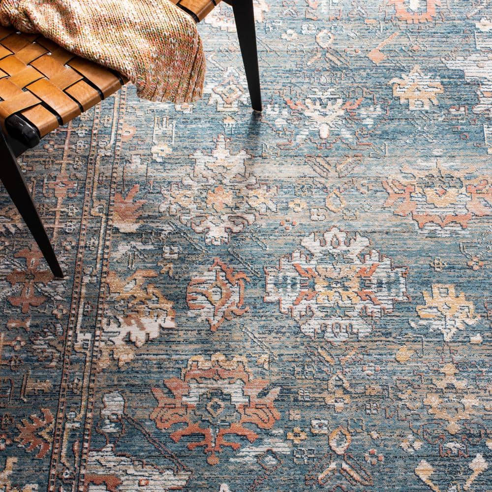 Elegant Blue & Ivory Synthetic 9' x 12' Easy-Care Area Rug
