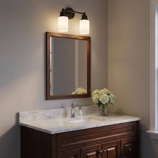 Ashford 13.5 in. W x 10.25 in H 2-Light Aged Iron Transitional Bathroom Vanity Light with Milk Drum Glass Shades