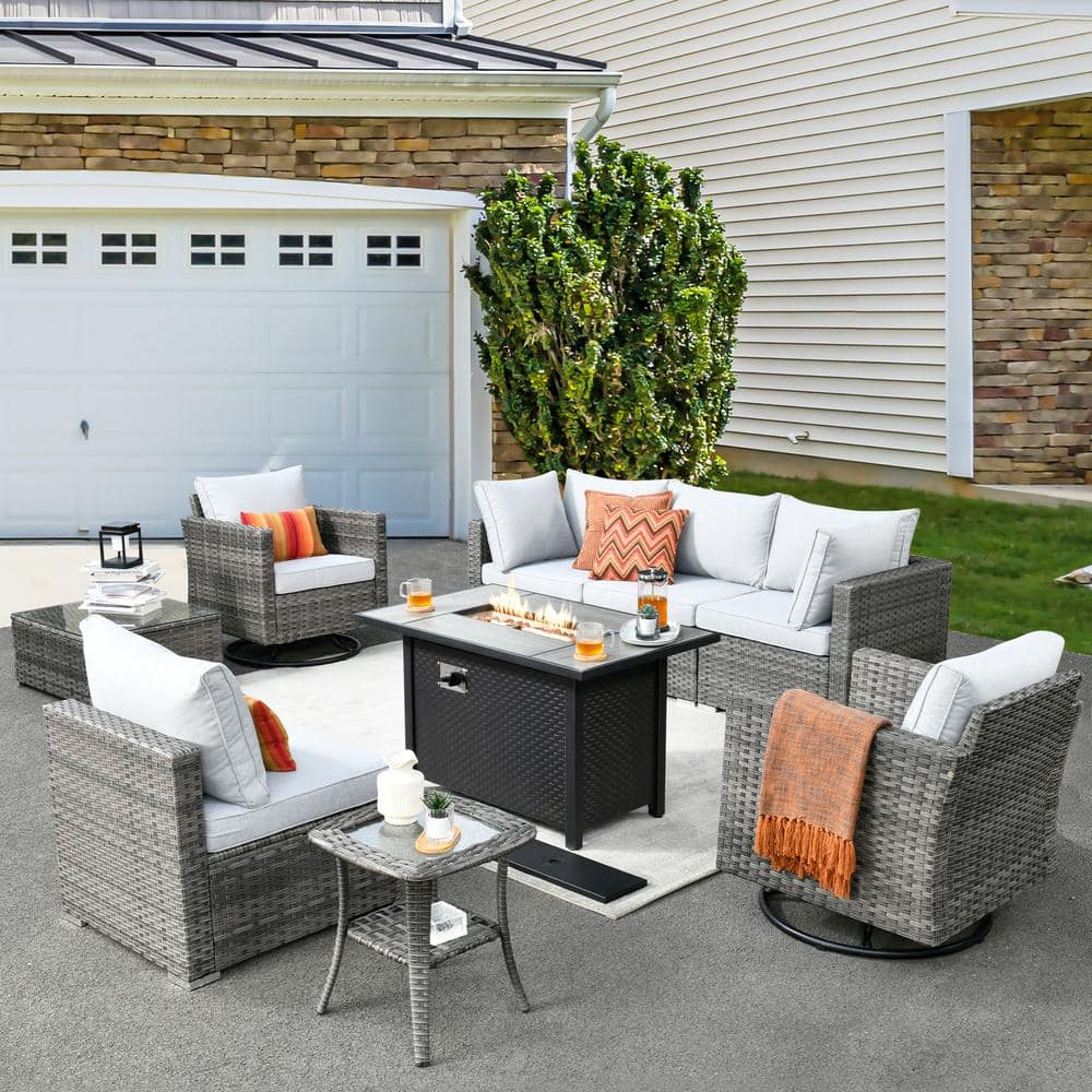 Harlotte 9-Piece Wicker Patio Rectangular Fire Pit Set with Gray Cushions and Swivel Rocking Chairs price history on PriceWatchPro