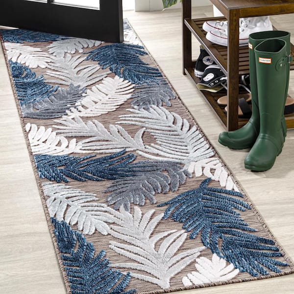 https://images.thdstatic.com/productImages/b04a3cf6-9a4b-4ffa-8a36-9f169bebf04a/svn/brown-navy-ivory-jonathan-y-outdoor-rugs-hwc101b-28-64_600.jpg