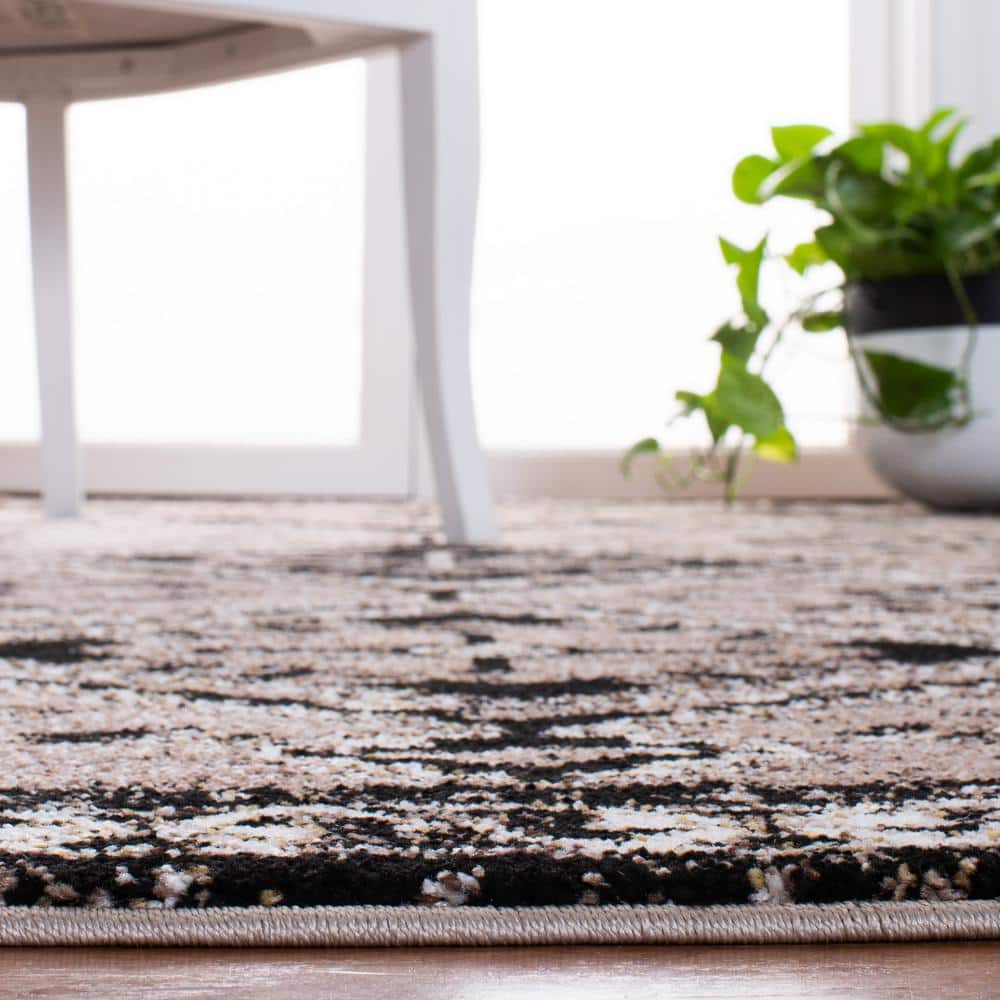 https://images.thdstatic.com/productImages/b050a2ed-6210-4210-9265-501af0b461a7/svn/brown-black-safavieh-area-rugs-vth293t-28-c3_1000.jpg