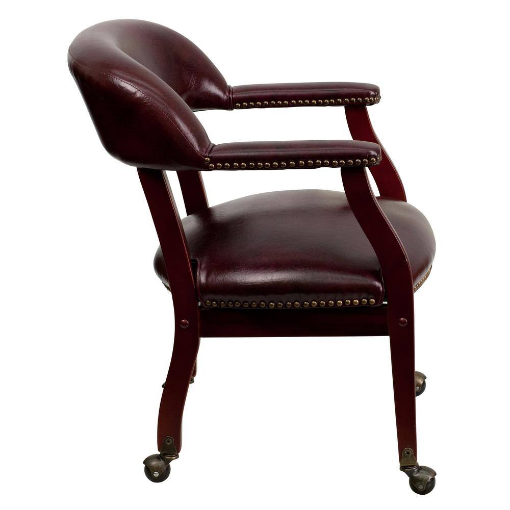 Elegant Oxblood Vinyl Conference Chair with Brass Nail Trim