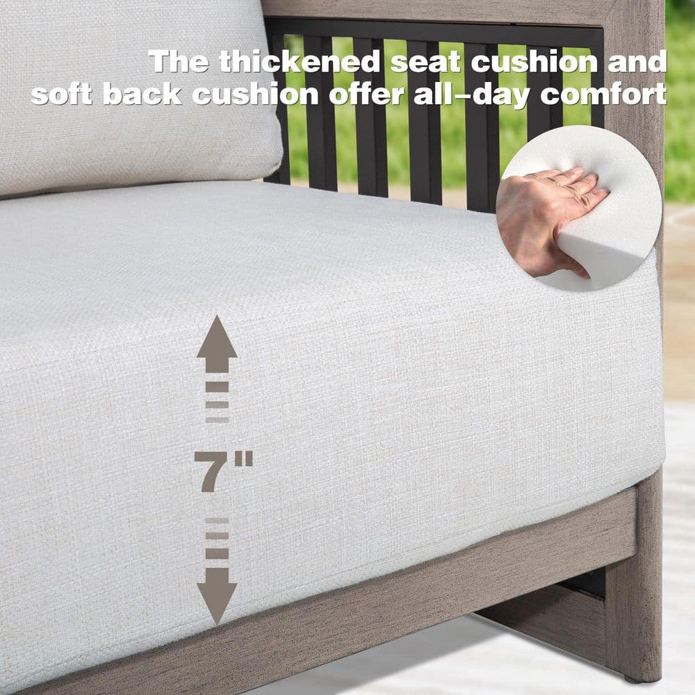 Close-up of a white seat cushion showing its 7-inch thickness.