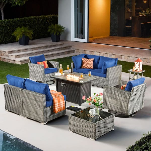 XIZZI Echo 9-Piece Wicker Patio Rectangular Fire Pit Set with Navy Blue Cushions and Swivel Rocking Chairs