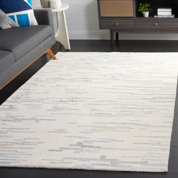 Renewal 5 ft. x 8 ft. Ivory/Light Blue Abstract Area Rug