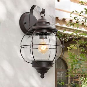 1-Light Bronze Industrial Farmhouse Wall Sconce Coastal Interior/Exterior Wall Sconce with Caged Seeded Glass Shade