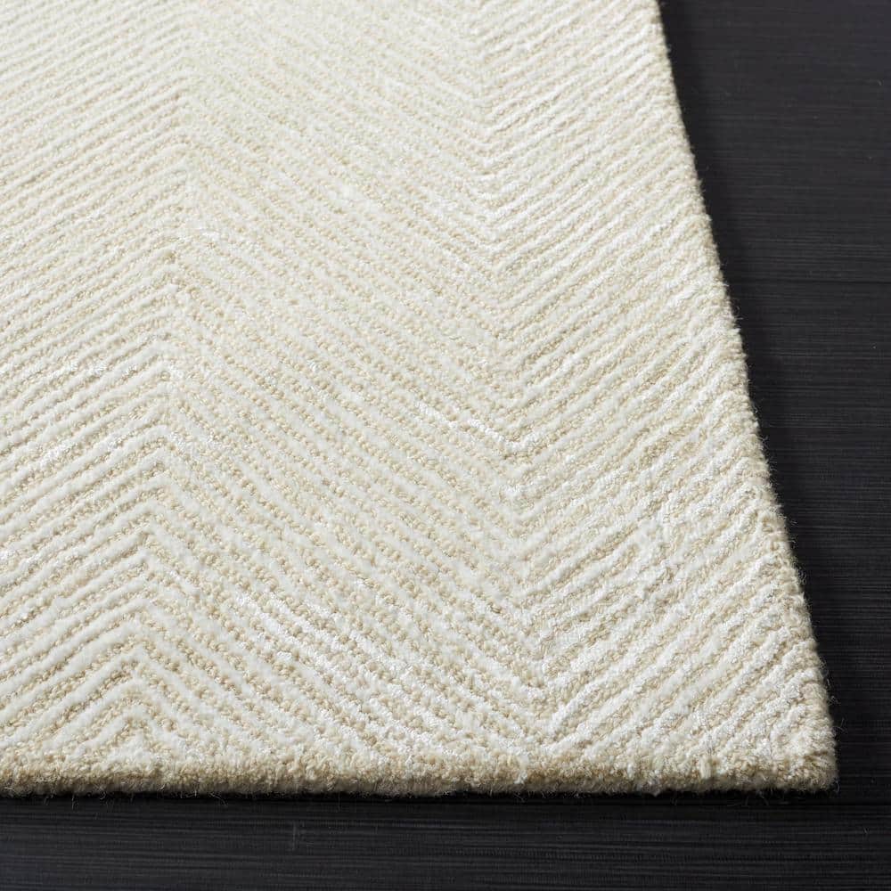 Ivory and Beige 9' x 12' Handmade Tufted Wool Viscose Rug