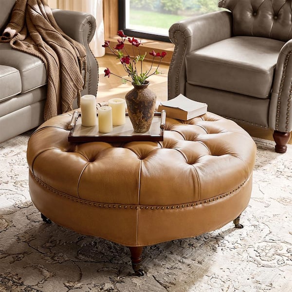 Geofredo Camel Leather Round Ottoman with Tufted Top Nailhead Trim