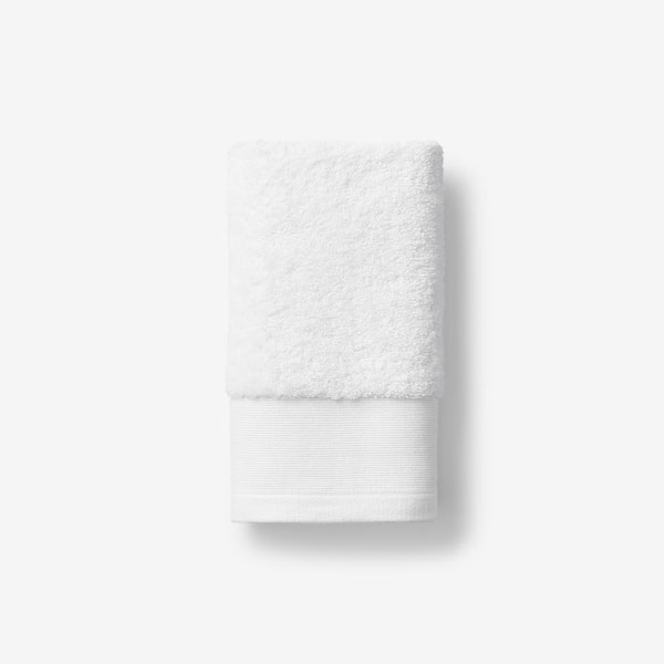 https://images.thdstatic.com/productImages/b0c09571-e72b-46e8-9add-1d9f11ec0884/svn/white-the-company-store-bath-towels-vk19-hand-white-64_600.jpg