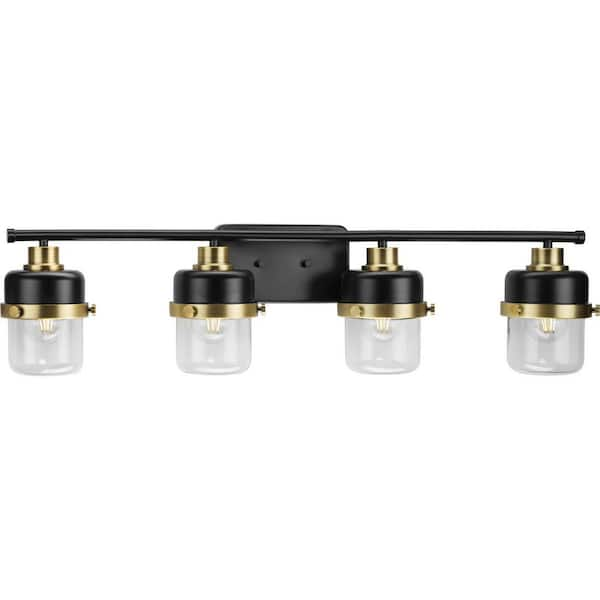 Progress Lighting Beckner Collection 33.75 in. 4-Light Matte Black Clear Glass Urban Industrial Vanity Light with Vintage Brass Accents