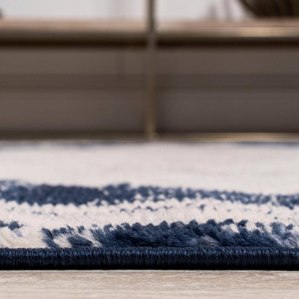 Ivory and Navy Synthetic Reversible Medallion Area Rug