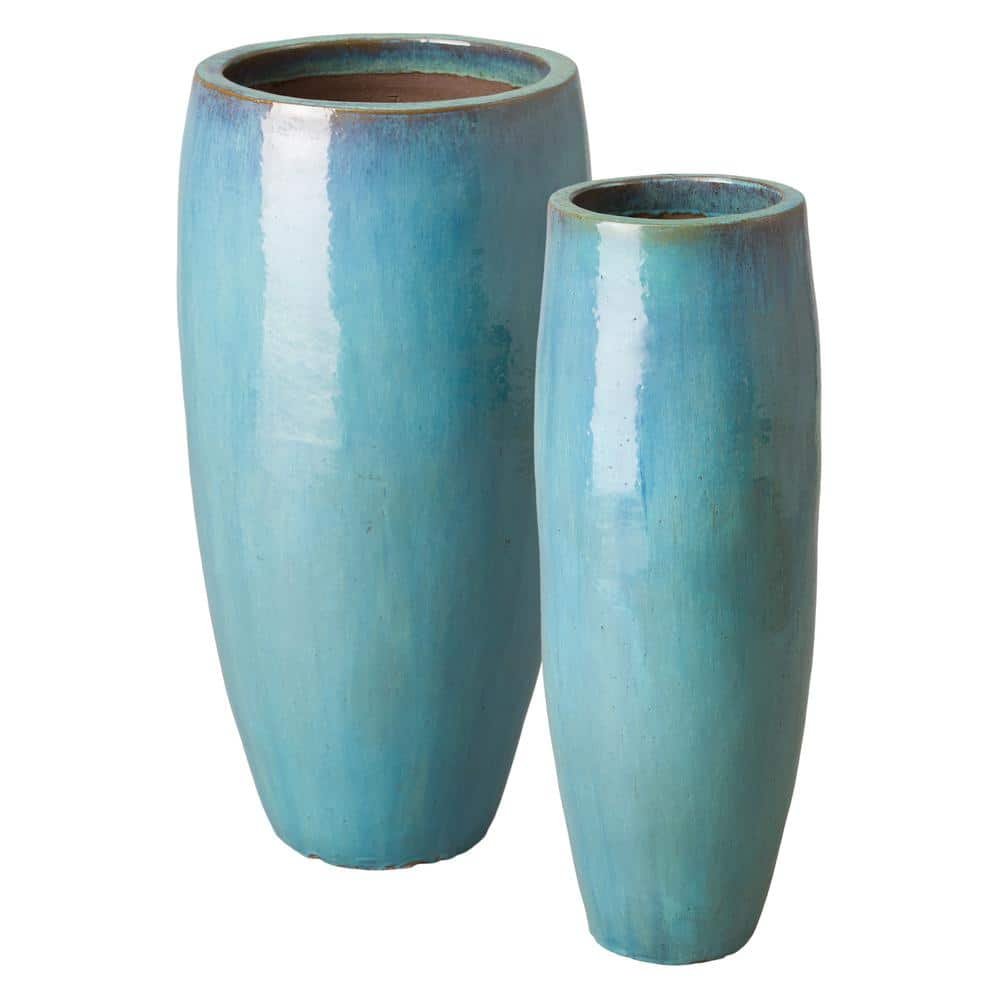 https://images.thdstatic.com/productImages/b0d8461a-1ea0-49c7-a3f0-81298ec1ca99/svn/teal-emissary-plant-pots-12059tl-2-64_1000.jpg