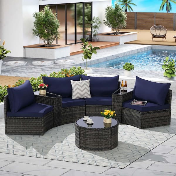 Zeus & Ruta 7-Piece Gray Wicker Half-Moon Outdoor Sectional Sofa Set with Dark Blue Cushions and 1 Glass Round Coffee Table