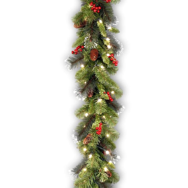 Unbranded 9 ft. Crestwood Spruce Garland with Battery Operated Warm White LED Lights